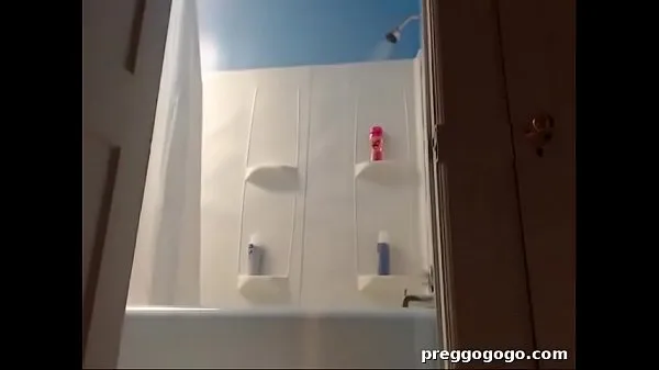Big Hot pregnant girl taking shower on webcam top Clips