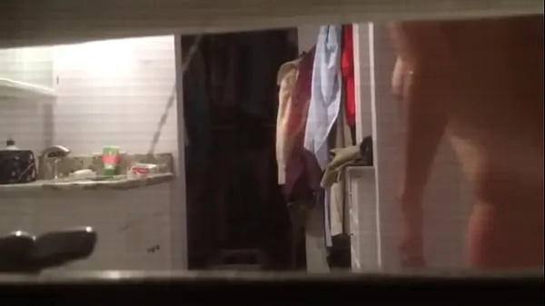 Big Spying on Milf towling off through window top Clips