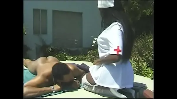 Big Nurse in white stockings seduces black dude sunbathing by the pool to fuck her top Clips