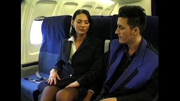 Veliki Brunette beauty wearing stewardess uniform gets fucked on a plane najboljši posnetki