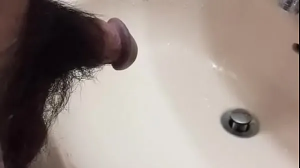 Big pee in washstand top Clips