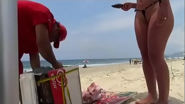 Big showing off on the beach top Clips