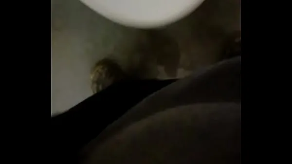 Peeing into a urinal in work Klip teratas besar