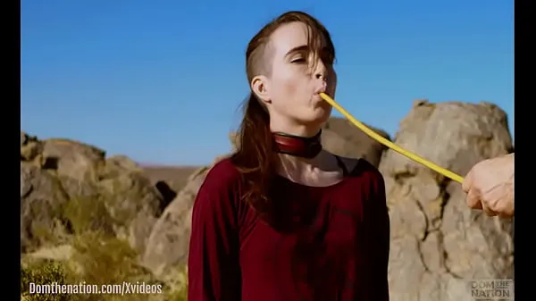 Big Petite, hardcore submissive masochist Brooke Johnson drinks piss, gets a hard caning, and get a severe facesitting rimjob session on the desert rocks of Joshua Tree in this Domthenation documentary top Clips