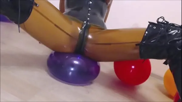 Big Big titty Fetish Mistress in latex rubber catsuit, latex corset, pvc boots top Clips