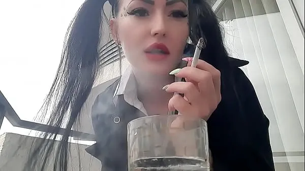 Veliki Smoking fetish. Dominatrix Nika smokes sexy and spits into a glass. Imagine that this glass is your mouth, and you are just an ashtray for Mistress najboljši posnetki